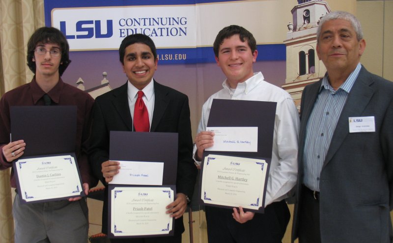 Photo of the three science fair winners and the ECE department chair.