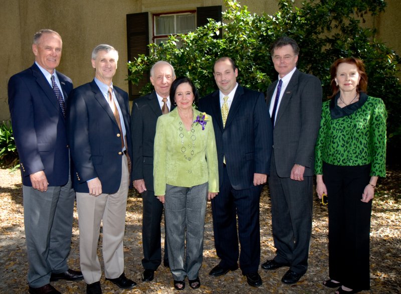 Photo of Broussards and LSU Officials