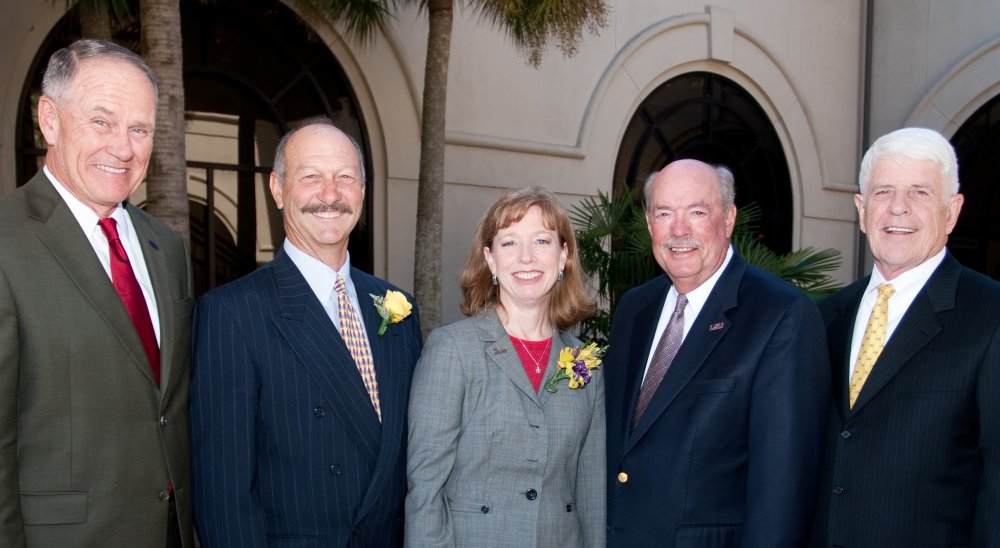 Photo of Karen and Bill Brack with LSU Officials